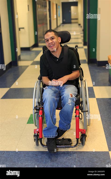 Boy With Spastic Quadriplegic Cerebral Palsy In The School Hallway