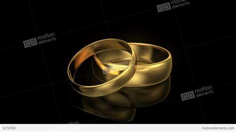 4k Zoom In Wedding Rings On Black Background Stock Animation 3274728