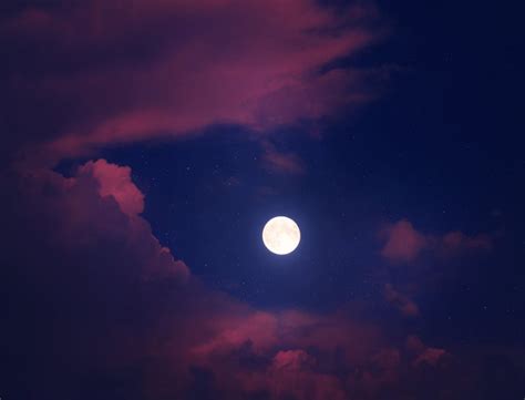 Full Moon Over Dark Clouds · Free Stock Photo