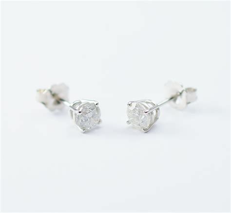 Home > earrings > diamond stud earrings >. 14K White Gold 1.00 Gram Round Diamond Stud Earrings | Property Room