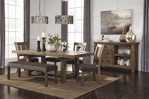 A dining table with benches provides for versatile seating since you can remove the furniture to another room and increase the seating space. Tamilo Gray/Brown Rectangular Extendable Dining Table from ...