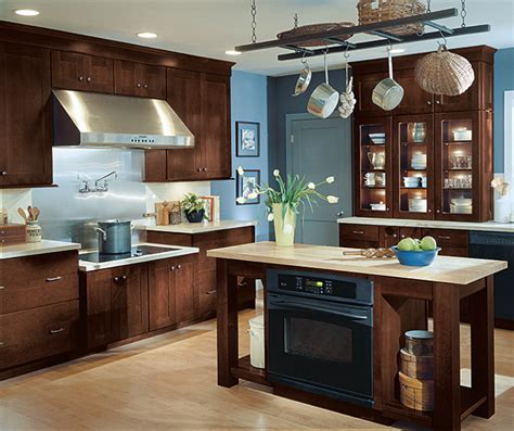 When you build your own pantry, keep the proportions of the rest of the kitchen in mind. Cream Kitchen Cabinets with Glaze - Schrock Cabinetry