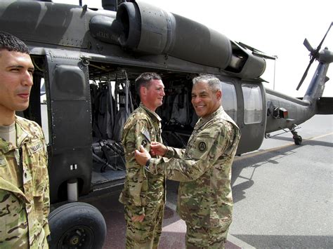 Blackhawk Crew Chiefs Receive Combat Patch From Us Army Central