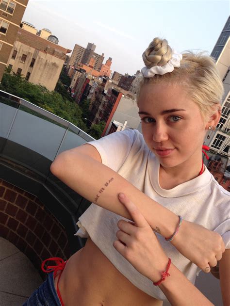 Miley Cyrus Gets Two New Tattoos All The Details And Pics Of Her New