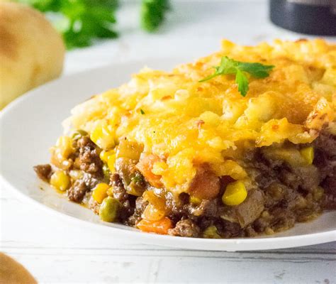 This easy shepherd's pie recipe is filled with lots of veggies and tender ground beef (or lamb), simmered together in the most delicious sauce, and topped with the creamiest mashed potatoes. Guinness Shepherd's Pie - Fox Valley Foodie