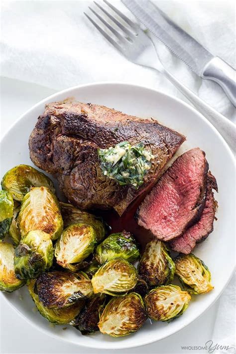 Place tenderloin on a rack in a shallow roasting pan. Best Filet Mignon Recipe w/Garlic Herb Butter (TIME CHART) | Wholesome Yum