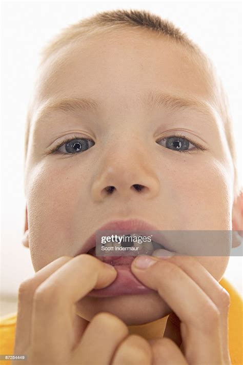Boy Showing Missing Tooth High Res Stock Photo Getty Images
