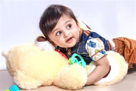 Cute Indian Baby Child Playing With Toy Stock Photo Image Of Asian