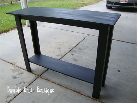 My daughter has 9 foot couch and needed a table like yours however she was concerned that her small dog would get behind the couch. Bumble Briar Boutique: How to build a sofa table...