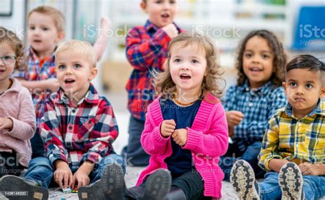 Preschool Children Singing During Circle Time Stock Photo Download
