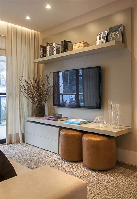 Check in as many different areas as possible deciding on what you do most in your modern living room may also help you with your decisions. 7 Best Ways to Decorate Around the TV | Salon pequeño ...