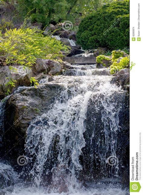 Scenic Man Made Waterfall In A Garden Stock Photo Image Of Leaves
