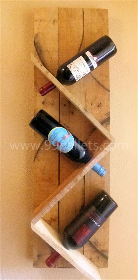 They are made from reclaimed wood and distressed with a rustic white finish. 15 Amazing DIY Wine Rack Ideas | The Craftiest Couple