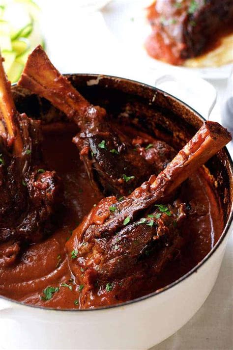 Braised lamb shanks slow cooked in an incredible port sauce. Slow Cooked Lamb Shanks in Red Wine Sauce | RecipeTin Eats ...