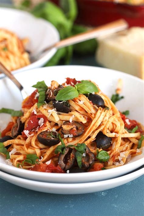 Pasta Puttanesca In A White Bowl With Basil On Top Easy Chicken Pot