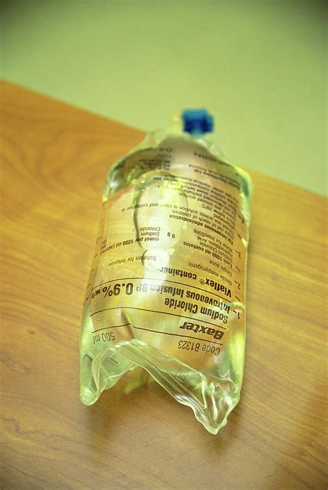 Intravenous Saline Drip Bag Photograph By Antonia Reevescience Photo