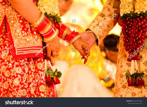 Indian Wedding Couple Holding Hands