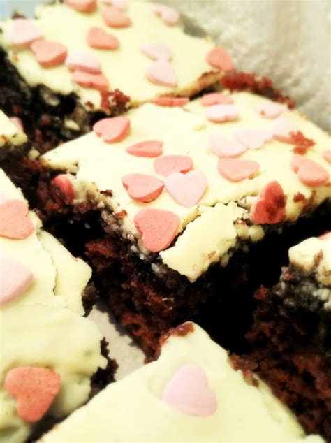 pretty and polished indulgent red velvet brownies with an oreo and white chocolate layer