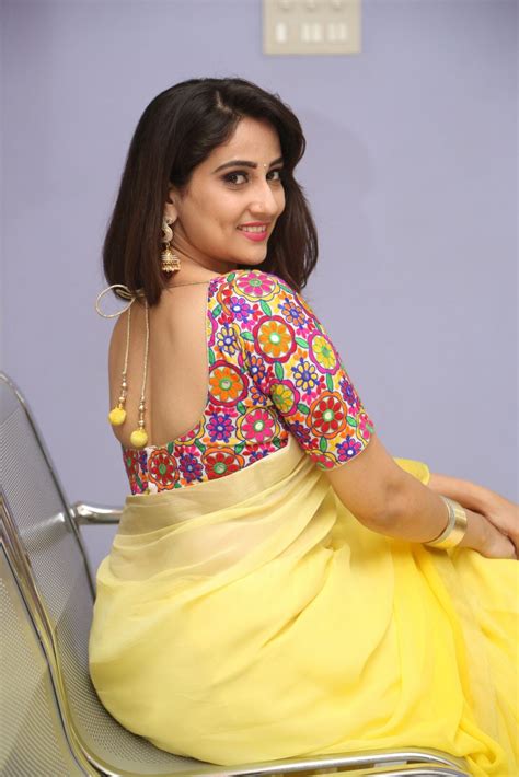 anchor manjusha in yellow saree photo gallery telugu actress gallery