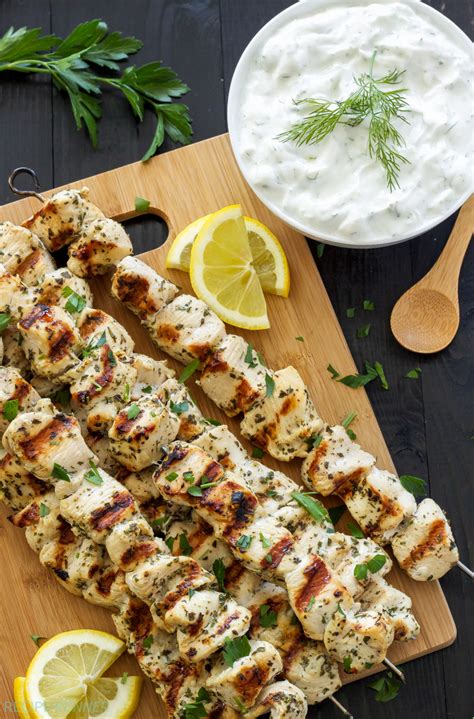 I like to serve this grilled chicken with a few mediterranean sides and salads; Greek Lemon Chicken Skewers with Tzatziki Sauce - Recipe ...