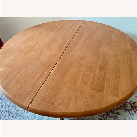 Round Expandable Mango Wood Dining Table Aptdeco