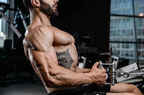 Handsome Power Athletic Man Diet Training Pumping Up Back Muscle Stock