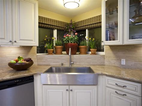 This stainless steel kitchen cabinets video shows examples of. A stainless steel apron front sink is offset by glass ...