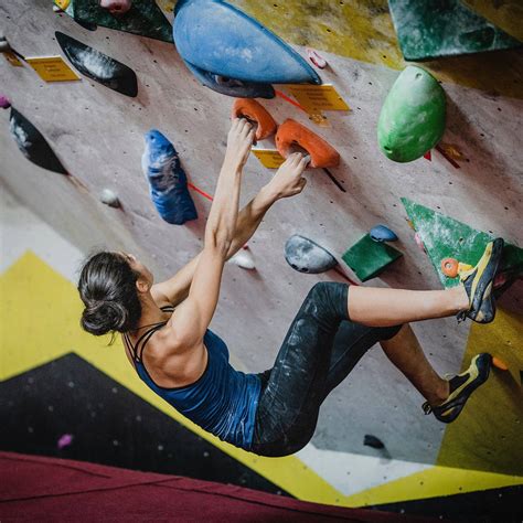 Download Girl Climbing Wall Rocks Wallpaper