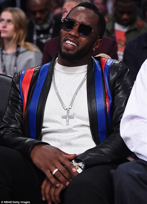 Diddy Cuddles Cassie As She Flashes Thigh At LA NBA Game Daily Mail Online