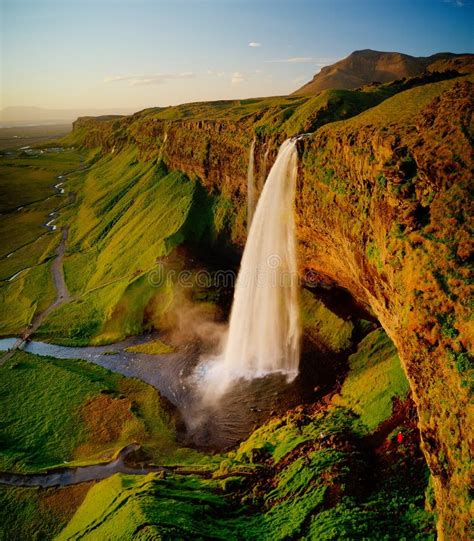 Beautiful Seljalandsfoss Waterfall In Iceland During Sunset Stock
