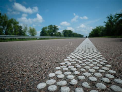 Road Markings On The Asphalt Receding Into The Distance Stock Image