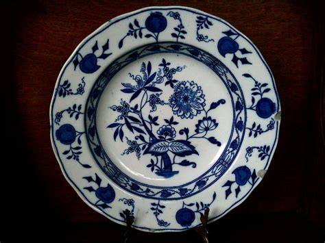 Two serving bowls have orange flowers and two serving bowls have turquoise flowers. Vintage English Onion Wedgwood Plate Blue White Ceramic ...