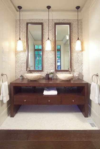 Never forget the mirrors above the vanity units, which also play an essential role in not just defining the look of the entire bathroom, but also enhance the existing lighting installations and their effect several fold. How Tall, Luxurious Mirrors Let You Lift Your Ceiling w/o ...