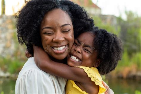 Happy Mother And Her Beautiful Daughter Smiling Stock Image Image Of