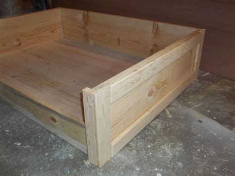 Their cots are also a cooler option that provide dogs with support and are easy to clean. Jaime of All Trades: DIY Large Wooden Dog Bed