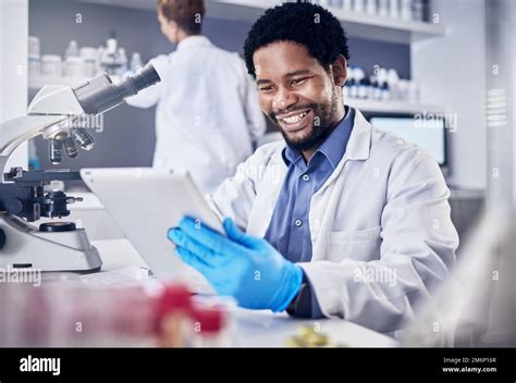 Scientist Research And Black Man With Tablet Laboratory And