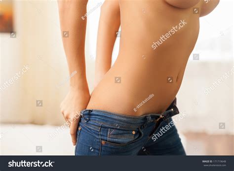 Taking Off Her Jeans Side View Stock Photo Shutterstock