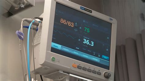 Handheld Monitor In Hospital Displays Heart Stock Footage Sbv