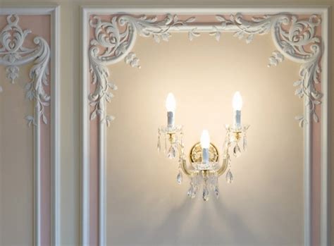 Base caps are installed on top of a simple flat board to architecturally enhance the room's appearance. Picture frame moulding - exclusive wall decorating ideas
