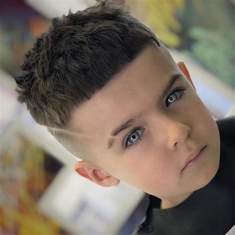 While it's never easy to watch your young tyke maturing, a new do lets. 29 Coolest Haircuts for Kids (2020 Trends) | StylesRant
