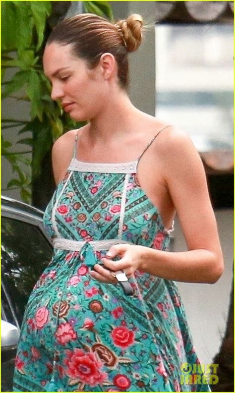 Pregnant Candice Swanepoel Covers Up Baby Bump In Summer Dress Photo