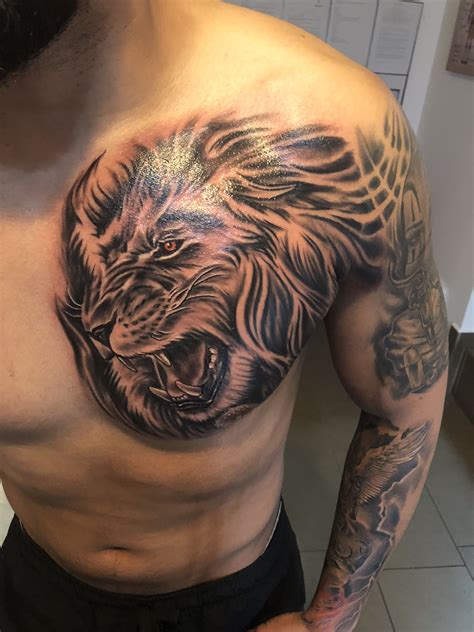 [41+] Tribal Lion Chest Tattoos For Men