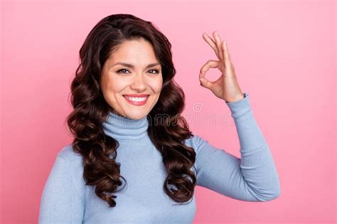 Photo Of Cute Cheerful Lady Dressed Blue Pullover Showing Okey Sign Smiling Isolated Pink Color