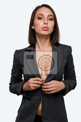 Sexy Business Woman In A Jacket On A Naked Body On A White Background