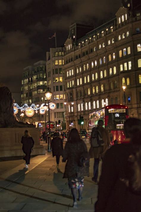 London Streets In Night With Street Lights And Crowd Walking Editorial