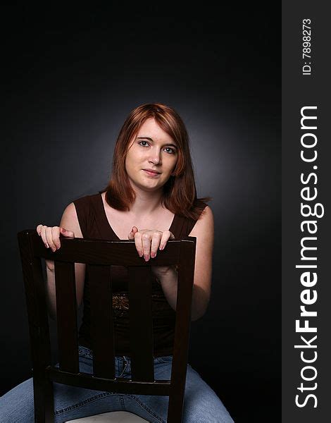 Pretty Teenage Girl Sitting Backwards In A Chair Free Stock Images