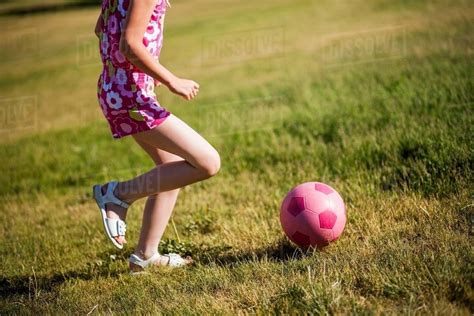 Girl Playing Soccer In Field Stock Photo Dissolve