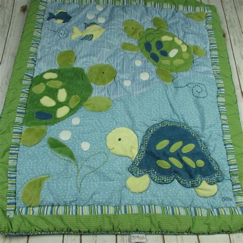 Shop thousands of low priced crib bedding sets for boys, girls & gender neutral. CoCaLo Baby Turtle Reef Quilt Comforter Fish Reversible ...