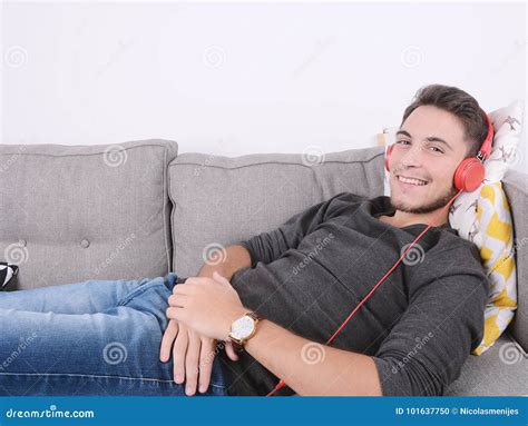 Man Listening Music On Couch Stock Photo Image Of Attractive Music