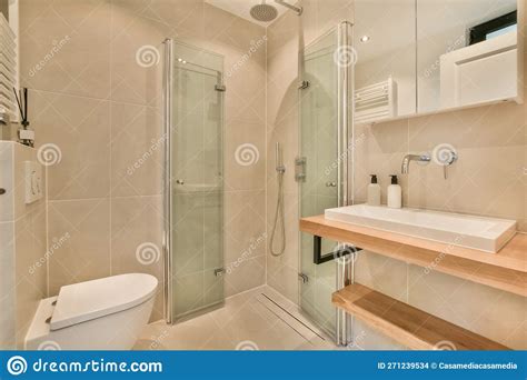 A Bathroom With A Toilet Sink And Shower Stock Photo Image Of Toilet
